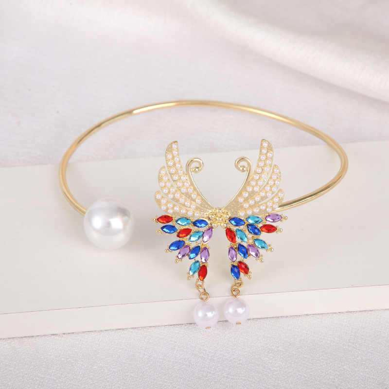 Aizkaru siksnas ar pūkām, tauriņa dizains, kaķa acs akmens, metāls (Materiāls: Metāls; Stils: Amerikas stils; Pielāgojams: Jā; Licencēts savs zīmols: Jā)