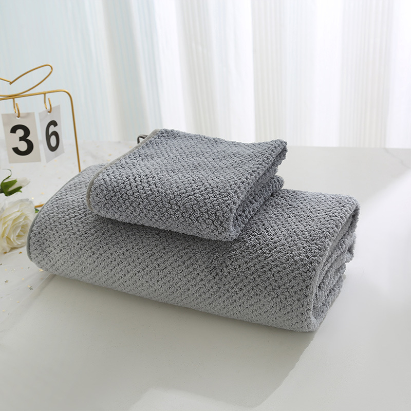 Vannitoas rätik — koralli fleece, ananassi võre tekstuur, kaal 200–300 g, 150D lõng, ääre õmblemine ja kohandatavus