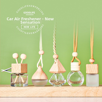 Stikla aromaterapijas pudele ar koka vāciņu un piekariņu auto atpakaļskata spogulim