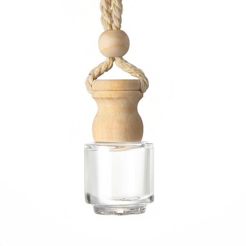 Stikla aromaterapijas pudele ar koka vāciņu un piekariņu auto atpakaļskata spogulim