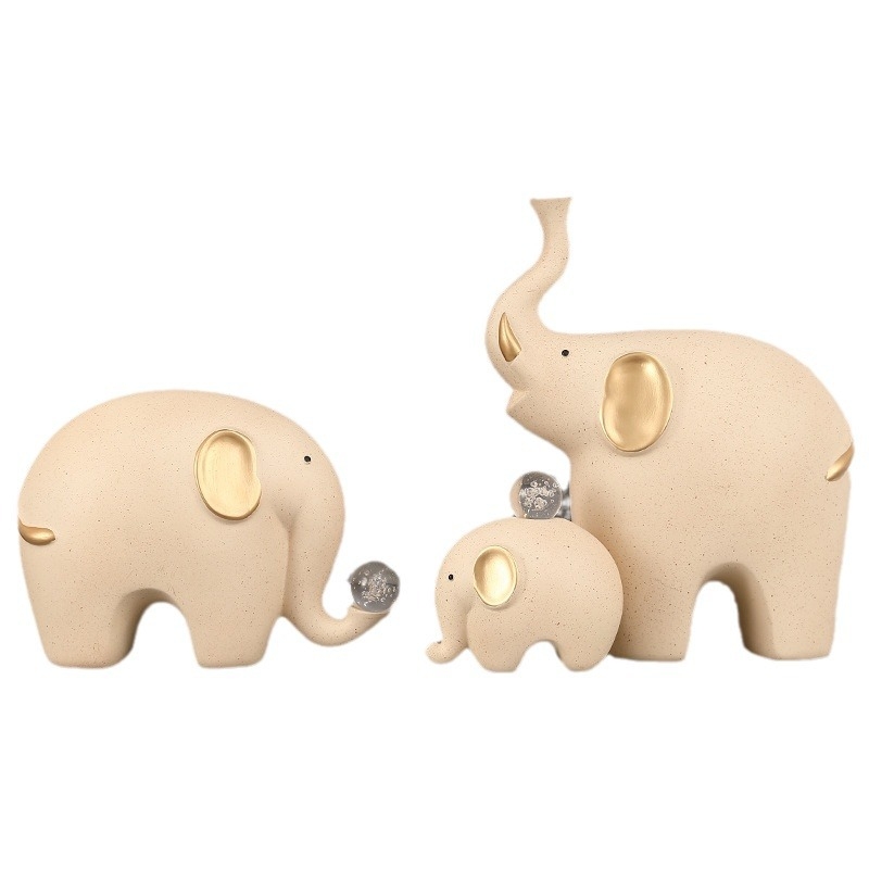 Elefanta figūra no sveķiem – četru cilvēku ģimene – moderns minimālisks galda dekors dzīvojamai istabai un TV skapim – daļēji roku darbs, daļēji mehāniska izstrāde