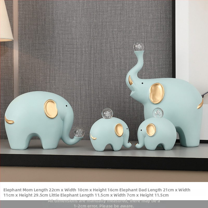 Elefanta figūra no sveķiem – četru cilvēku ģimene – moderns minimālisks galda dekors dzīvojamai istabai un TV skapim – daļēji roku darbs, daļēji mehāniska izstrāde
