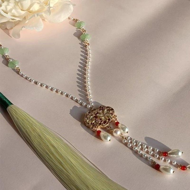 Kaklarota ar kulonu nacionālā stilā, metāla kvalitāte 0,4, tīrība K5, vecuma grupa 3–10 gadi, atsevišķi iepakots, Peach Sunseeker