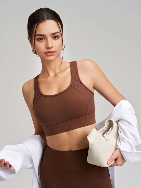 Sieviešu sporta krūšturis ar krūšu spilventiņu, galvenais audums neilons 75%, pildījums spandekss 25%, pilns kauss, vidējā kausa forma, elpojoša mugura ar sietu