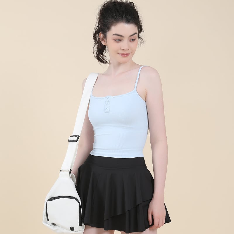 Sieviešu ribotā muguras sporta topa ar planiem pleciem — viengabala, ar fiksētām dubultām siksnām, 3/4 krūšu uzlīme, oderējums no spandeksa, materiāls: neilons/elastāns 80/20, piemērots skrējienam, fitnesam, Pilates un jogai