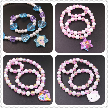 Bērnu kaklarotas un rokassprādzes komplekts ar pasakas princese motīvu — rezīns, atsevišķi iepakots, tīrība K5, 0,05 dārgmetāla kvalitāte, 2021. gada pavasaris