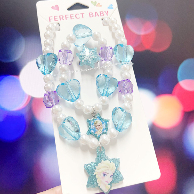 Bērnu kaklarotas un rokassprādzes komplekts ar pasakas princese motīvu — rezīns, atsevišķi iepakots, tīrība K5, 0,05 dārgmetāla kvalitāte, 2021. gada pavasaris