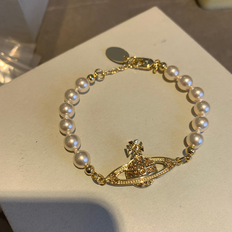 Ogrlica Saturn perlama, pozlaćen privjesak, lanac s perlom, Seiko obrada, težina 8 g