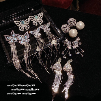 Auskari NVNV THUI, sintētiskais kubiskais cirkonis, forma lente, roku darbs, pils stils