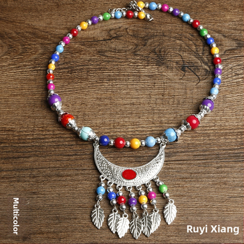 Etno stiiliga kaelakee lillekujundusega; materjalid: kangas ja segamaterjalid; bränd: Confucianism and Yixiang; päritolu: Yunnan