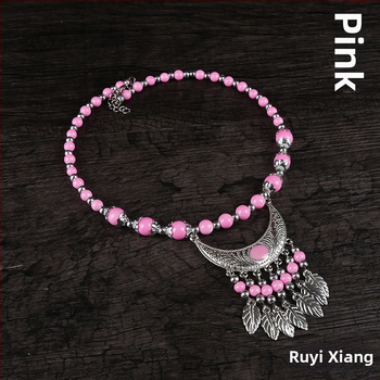 Etno stiiliga kaelakee lillekujundusega; materjalid: kangas ja segamaterjalid; bränd: Confucianism and Yixiang; päritolu: Yunnan