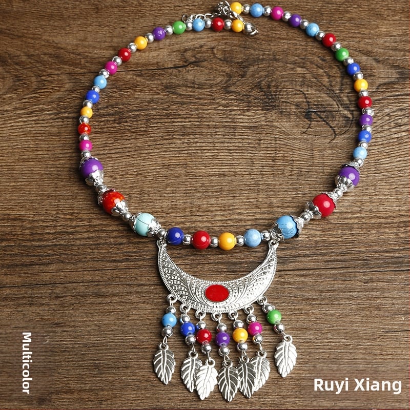 Etno stiiliga kaelakee lillekujundusega; materjalid: kangas ja segamaterjalid; bränd: Confucianism and Yixiang; päritolu: Yunnan