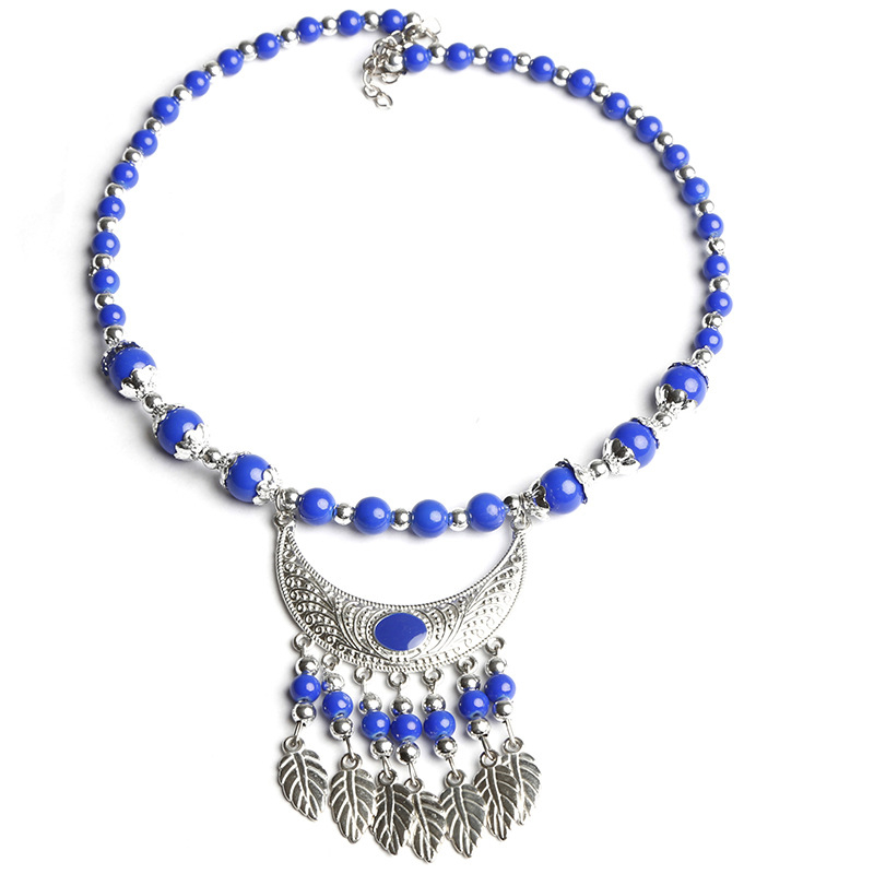 Etno stiiliga kaelakee lillekujundusega; materjalid: kangas ja segamaterjalid; bränd: Confucianism and Yixiang; päritolu: Yunnan