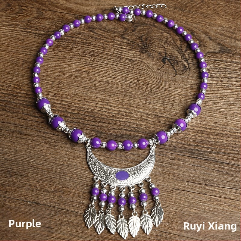 Etno stiiliga kaelakee lillekujundusega; materjalid: kangas ja segamaterjalid; bränd: Confucianism and Yixiang; päritolu: Yunnan