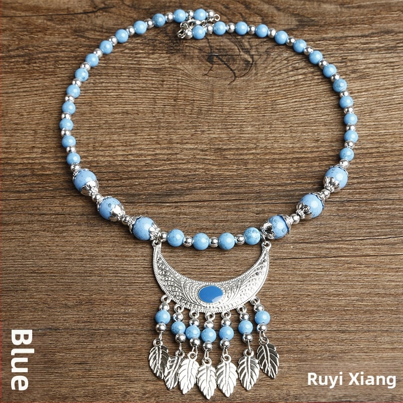 Etno stiiliga kaelakee lillekujundusega; materjalid: kangas ja segamaterjalid; bränd: Confucianism and Yixiang; päritolu: Yunnan