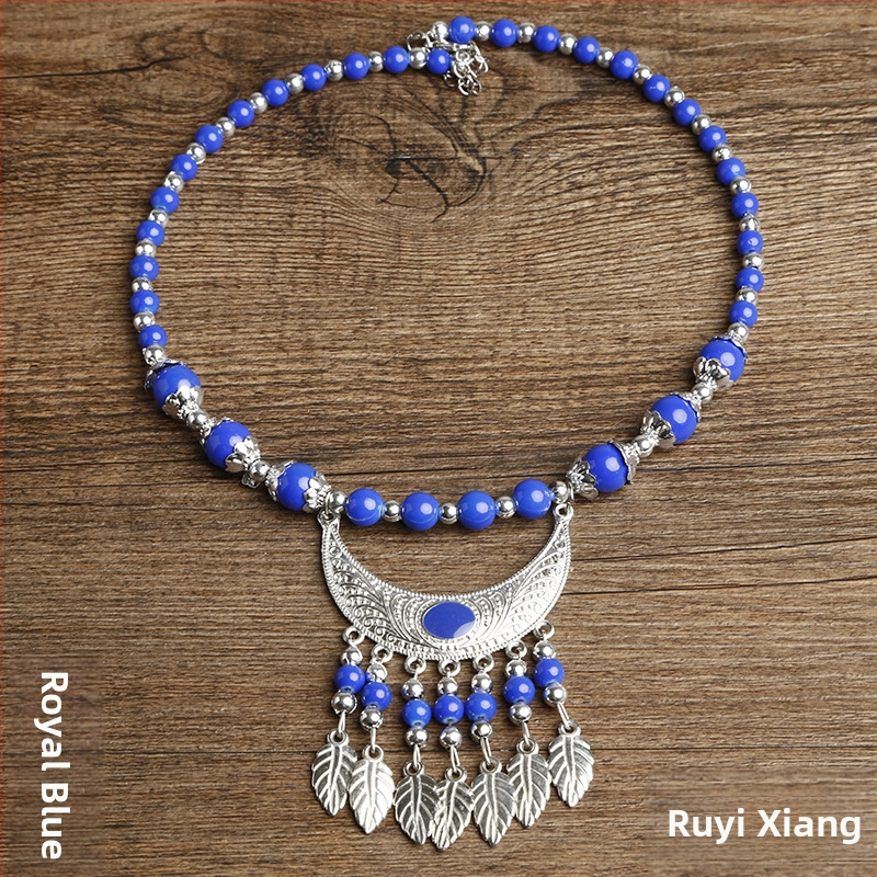 Etno stiiliga kaelakee lillekujundusega; materjalid: kangas ja segamaterjalid; bränd: Confucianism and Yixiang; päritolu: Yunnan