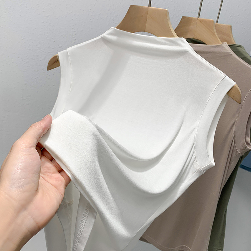 Sievietēm modal topiņš bez piedurknēm, plāns bāzes tops, šaurs piegriezums, pusaugstā apkakle, 70-80% viskoze, pavasaris 2025