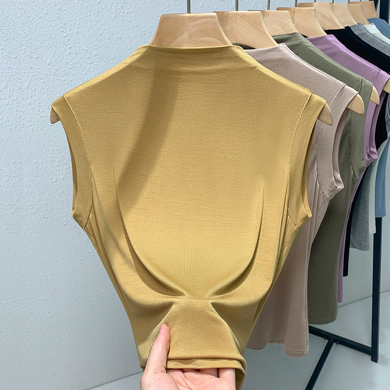 Sievietēm modal topiņš bez piedurknēm, plāns bāzes tops, šaurs piegriezums, pusaugstā apkakle, 70-80% viskoze, pavasaris 2025