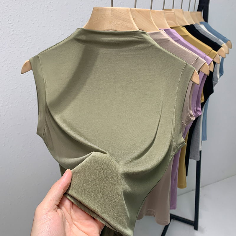 Sievietēm modal topiņš bez piedurknēm, plāns bāzes tops, šaurs piegriezums, pusaugstā apkakle, 70-80% viskoze, pavasaris 2025