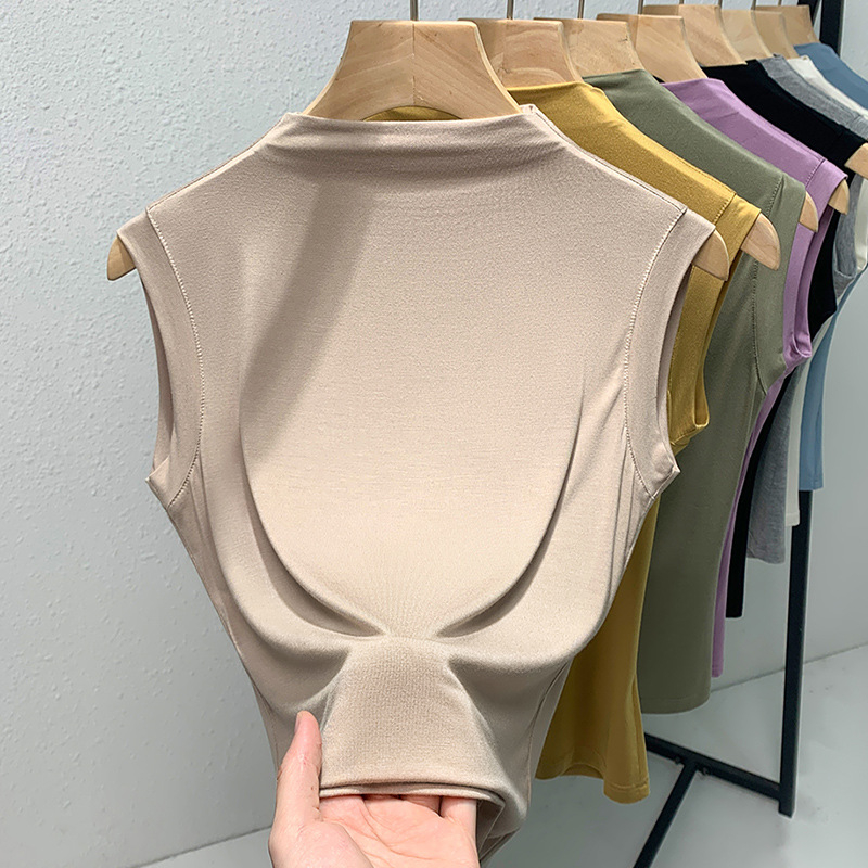 Sievietēm modal topiņš bez piedurknēm, plāns bāzes tops, šaurs piegriezums, pusaugstā apkakle, 70-80% viskoze, pavasaris 2025