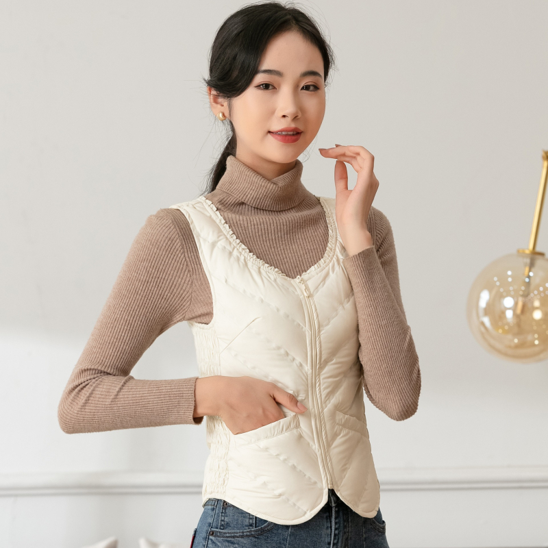 Sieviešu dūnu veste, plāna, slaida silueta, pildījums: pīles pūka, rāvējslēdzējs, apaļš kakls, īss garums