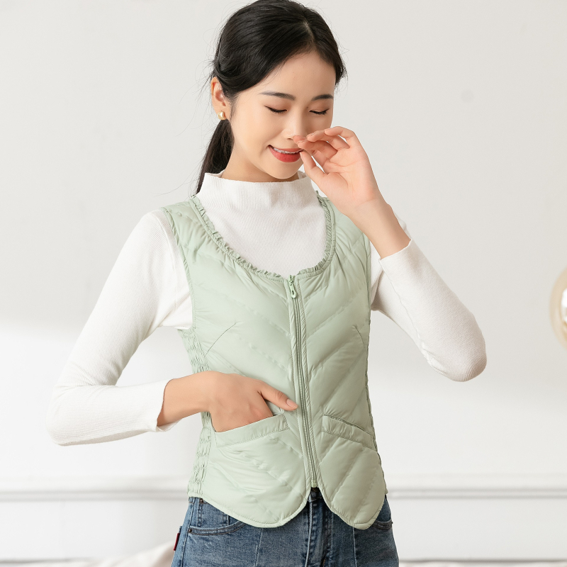 Sieviešu dūnu veste, plāna, slaida silueta, pildījums: pīles pūka, rāvējslēdzējs, apaļš kakls, īss garums