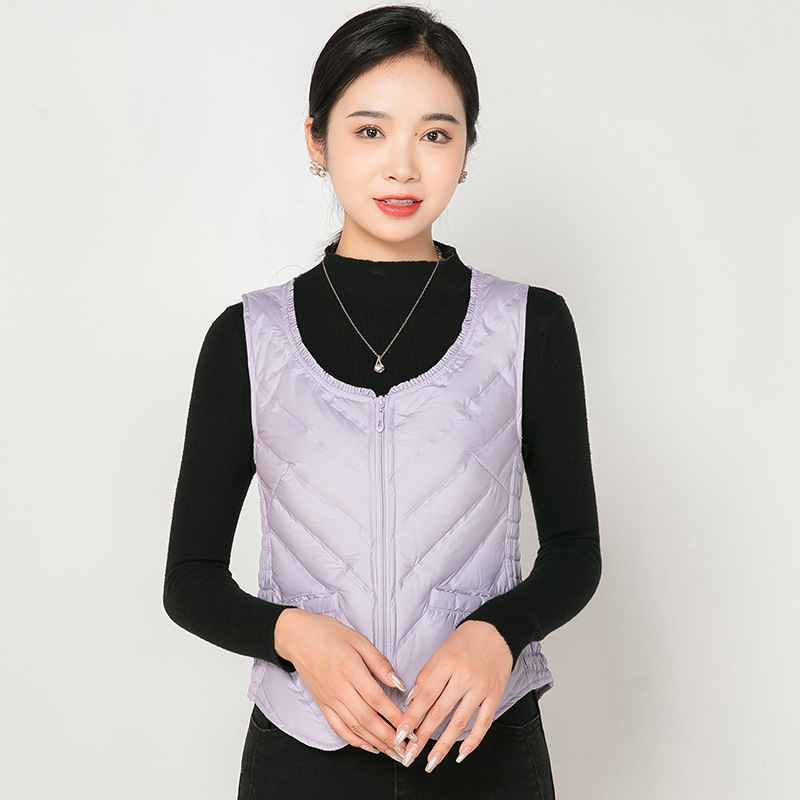 Sieviešu dūnu veste, plāna, slaida silueta, pildījums: pīles pūka, rāvējslēdzējs, apaļš kakls, īss garums