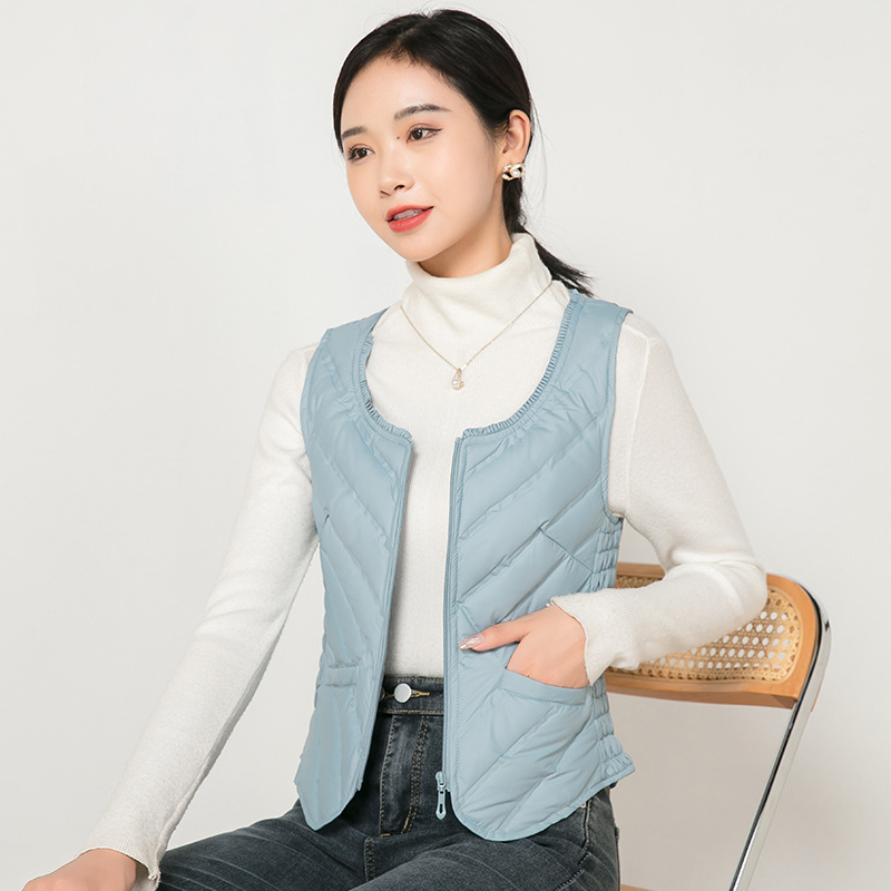 Sieviešu dūnu veste, plāna, slaida silueta, pildījums: pīles pūka, rāvējslēdzējs, apaļš kakls, īss garums