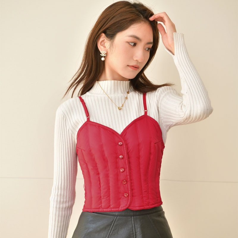 Sieviešu dūnu veste, šaurs piegriezums, balta pīļu dūnu pildījums 81–85%, īss garums 40–50 cm, poliesteršķiedra