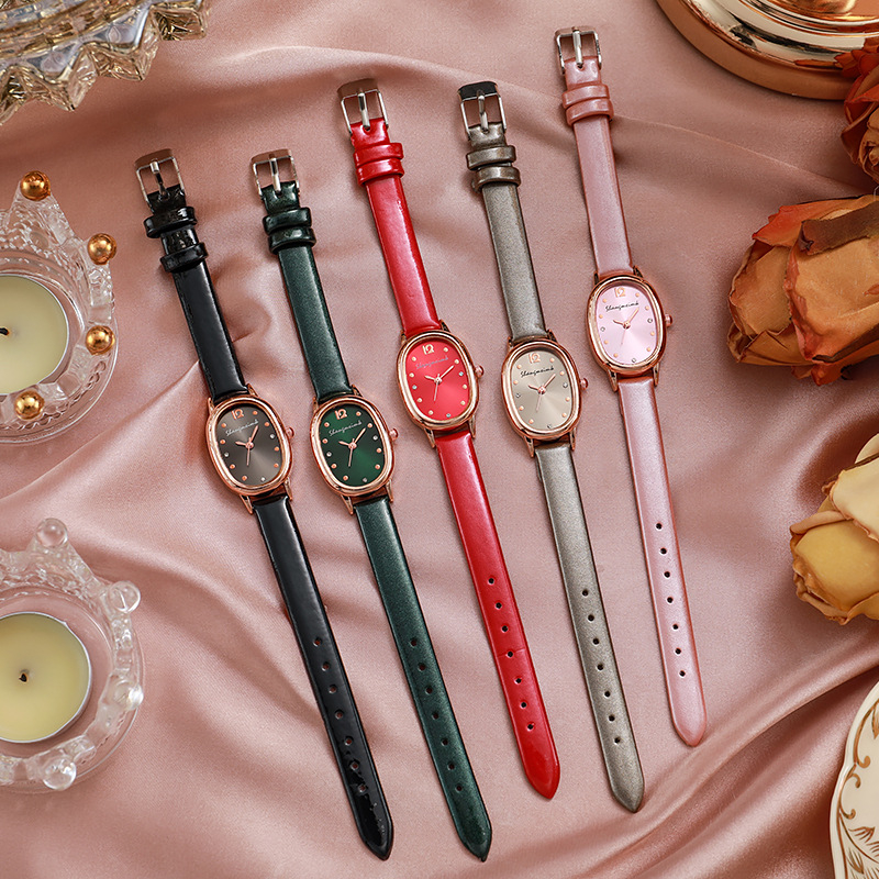 Női diákóra ovális számlappal, kvarc működésű, analóg kijelző, műbőr szíj, ötvözetes tokkal