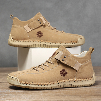 Muške Martin čizme, ručno šivane, srednje visine, prozrađivi gornji dio, slip-on s elastičnom trakom, gumeni potplat