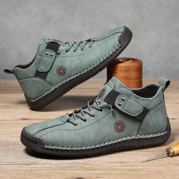 Muške Martin čizme, ručno šivane, srednje visine, prozrađivi gornji dio, slip-on s elastičnom trakom, gumeni potplat