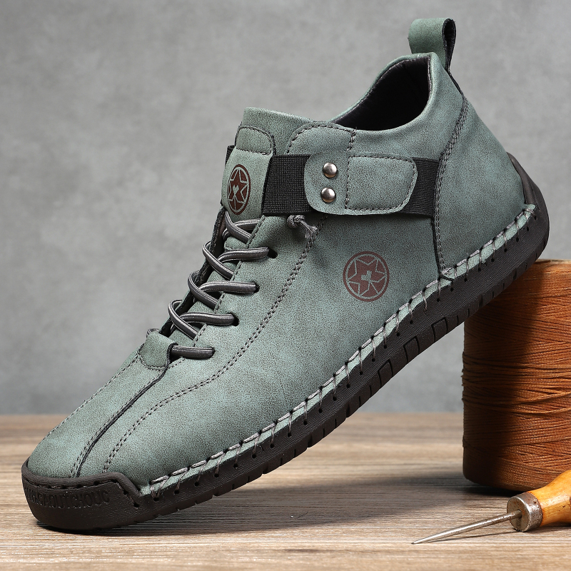 Muške Martin čizme, ručno šivane, srednje visine, prozrađivi gornji dio, slip-on s elastičnom trakom, gumeni potplat