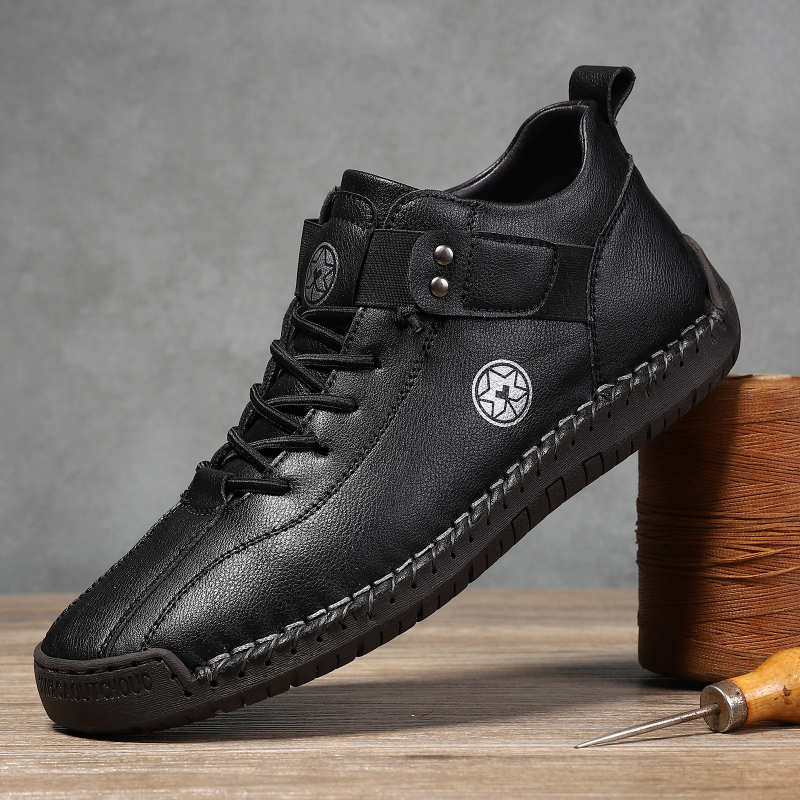 Muške Martin čizme, ručno šivane, srednje visine, prozrađivi gornji dio, slip-on s elastičnom trakom, gumeni potplat