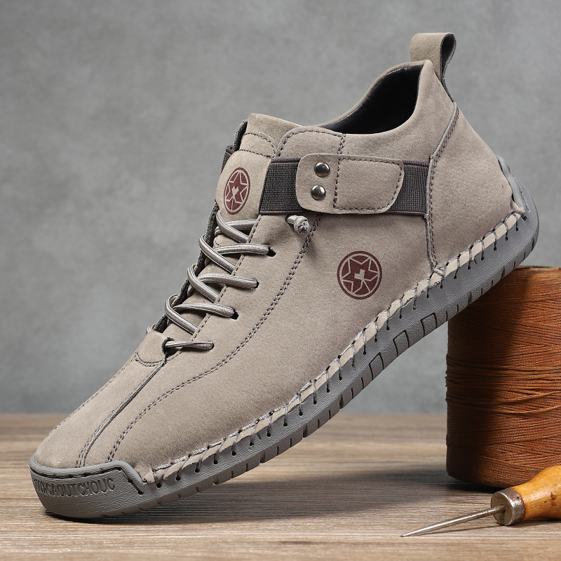 Muške Martin čizme, ručno šivane, srednje visine, prozrađivi gornji dio, slip-on s elastičnom trakom, gumeni potplat