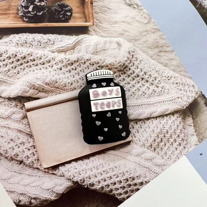 Apple duomenų kabelio vyniojimo įrenginys su karikatūriniu pingvino ir tigro dizainu; apsaugo kabelį nuo lūžimo; vyniojimo tipas: atviras; stilius: piešiniai; prekė Seven