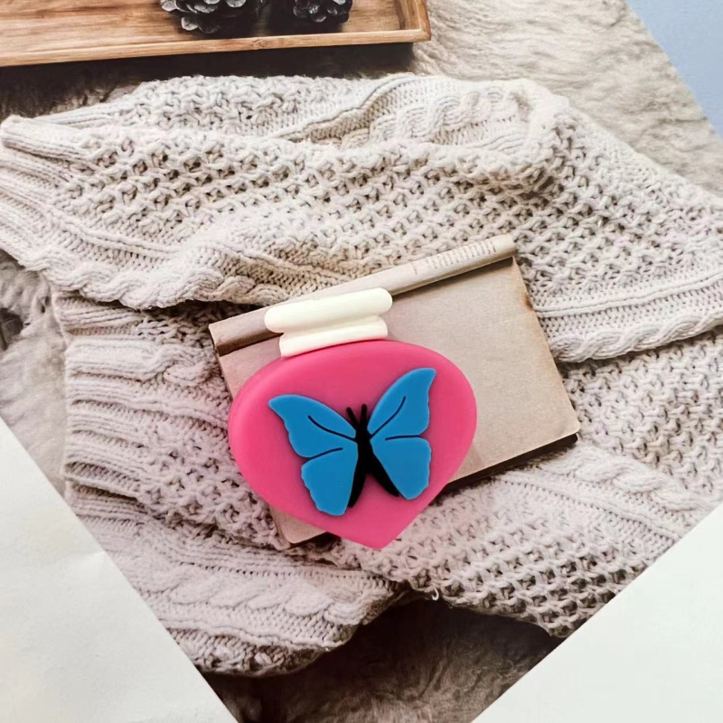 Apple duomenų kabelio vyniojimo įrenginys su karikatūriniu pingvino ir tigro dizainu; apsaugo kabelį nuo lūžimo; vyniojimo tipas: atviras; stilius: piešiniai; prekė Seven