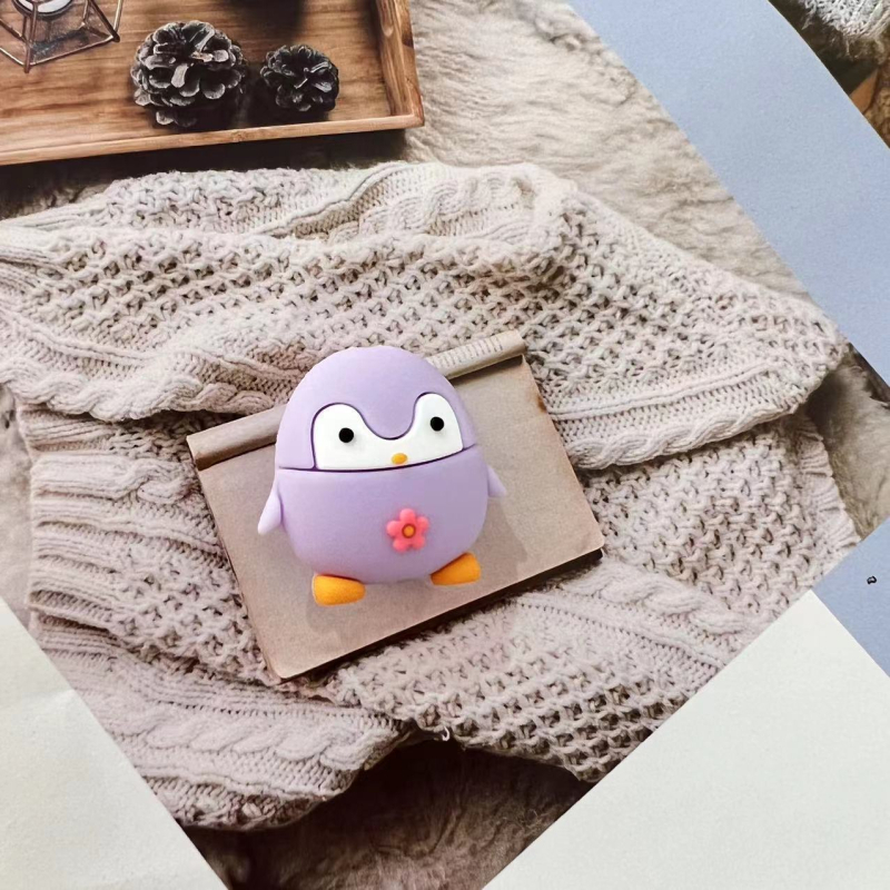 Apple duomenų kabelio vyniojimo įrenginys su karikatūriniu pingvino ir tigro dizainu; apsaugo kabelį nuo lūžimo; vyniojimo tipas: atviras; stilius: piešiniai; prekė Seven