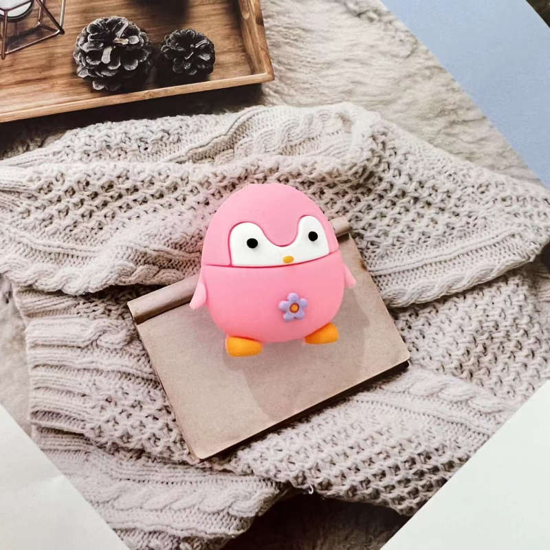 Apple duomenų kabelio vyniojimo įrenginys su karikatūriniu pingvino ir tigro dizainu; apsaugo kabelį nuo lūžimo; vyniojimo tipas: atviras; stilius: piešiniai; prekė Seven