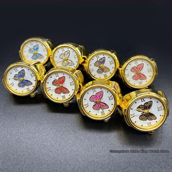 Žiedinis laikrodis – Kvarcinis SL68 mechanizmas; Nerūdijančio plieno dirželis; Korpusas: lydinys; Vandens atsparumas: Nėra atsparumo vandeniui