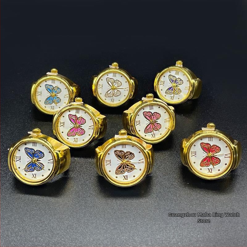 Žiedinis laikrodis – Kvarcinis SL68 mechanizmas; Nerūdijančio plieno dirželis; Korpusas: lydinys; Vandens atsparumas: Nėra atsparumo vandeniui