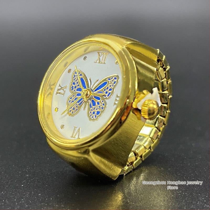 Žiedinis laikrodis – Kvarcinis SL68 mechanizmas; Nerūdijančio plieno dirželis; Korpusas: lydinys; Vandens atsparumas: Nėra atsparumo vandeniui