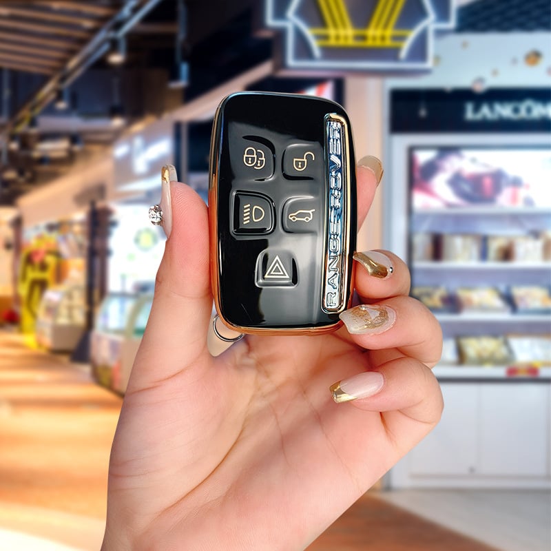 TPU võtmekarp Land Roveri ja Jaguari jaoks, cartoon-stiilis, klambriga kaas