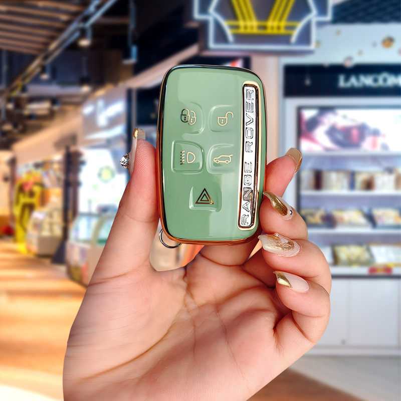 TPU võtmekarp Land Roveri ja Jaguari jaoks, cartoon-stiilis, klambriga kaas