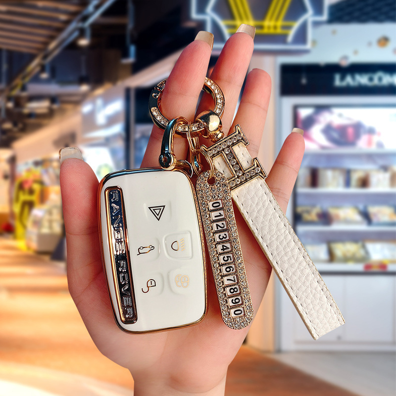 TPU võtmekarp Land Roveri ja Jaguari jaoks, cartoon-stiilis, klambriga kaas