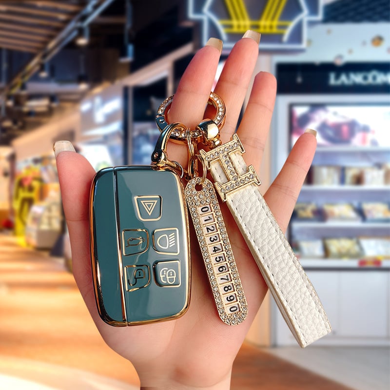 TPU võtmekarp Land Roveri ja Jaguari jaoks, cartoon-stiilis, klambriga kaas