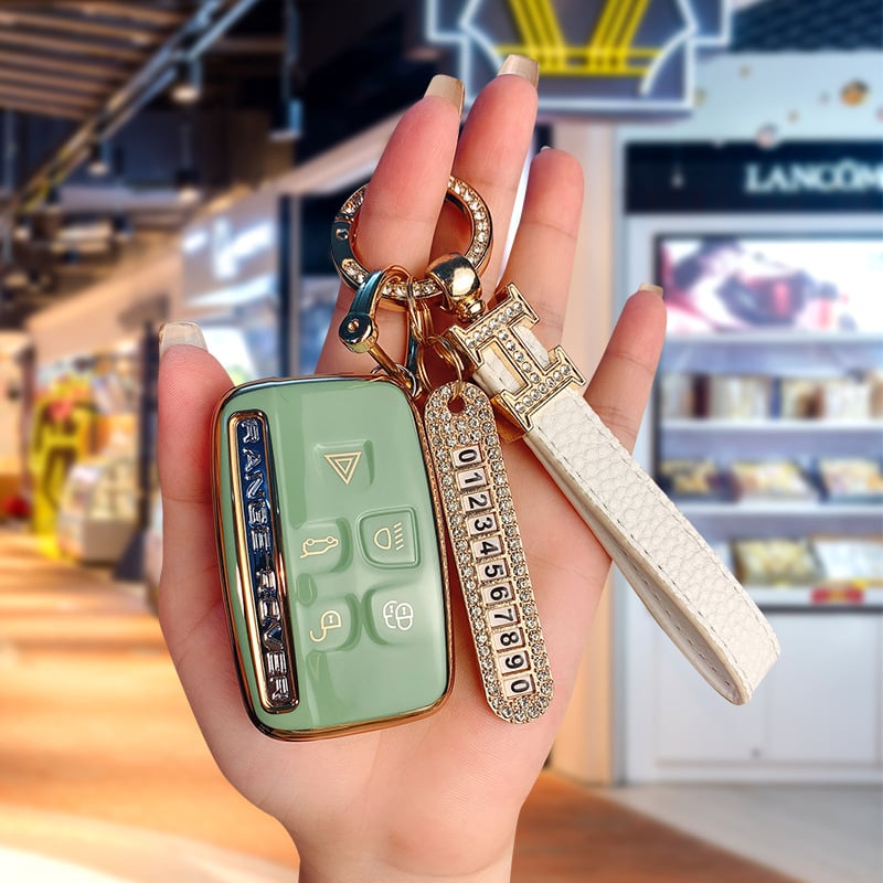 TPU võtmekarp Land Roveri ja Jaguari jaoks, cartoon-stiilis, klambriga kaas