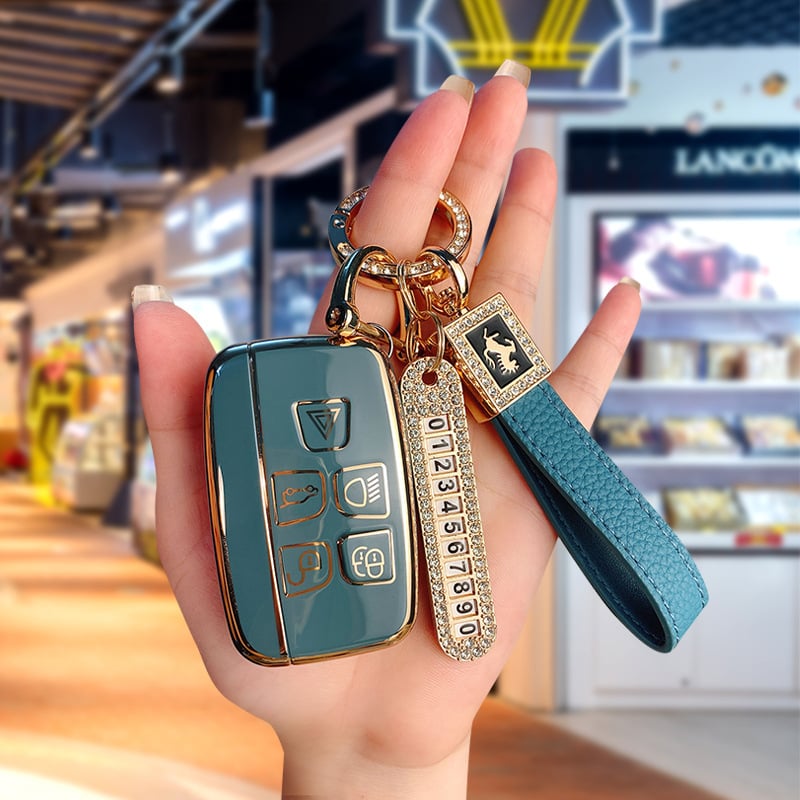 TPU võtmekarp Land Roveri ja Jaguari jaoks, cartoon-stiilis, klambriga kaas