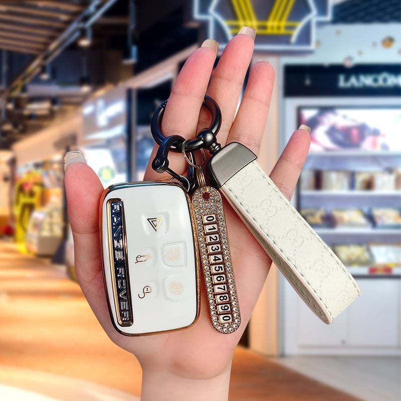 TPU võtmekarp Land Roveri ja Jaguari jaoks, cartoon-stiilis, klambriga kaas