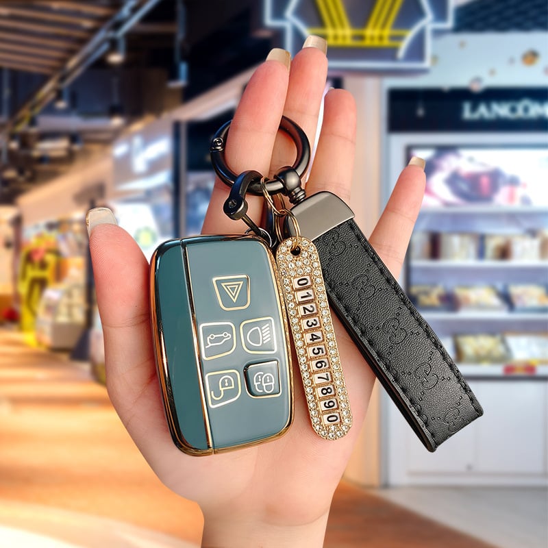 TPU võtmekarp Land Roveri ja Jaguari jaoks, cartoon-stiilis, klambriga kaas